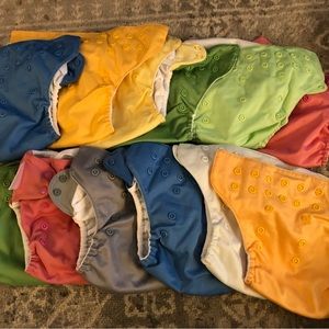 Set of Bum Genius Cloth Diapers and pads